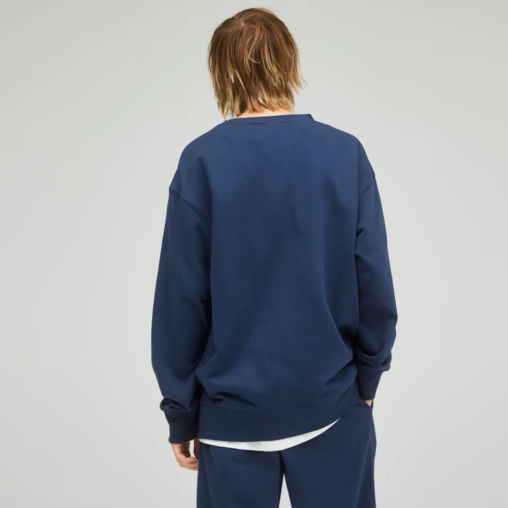 New Balance Bluza unisex UT21501NGO – granatowa