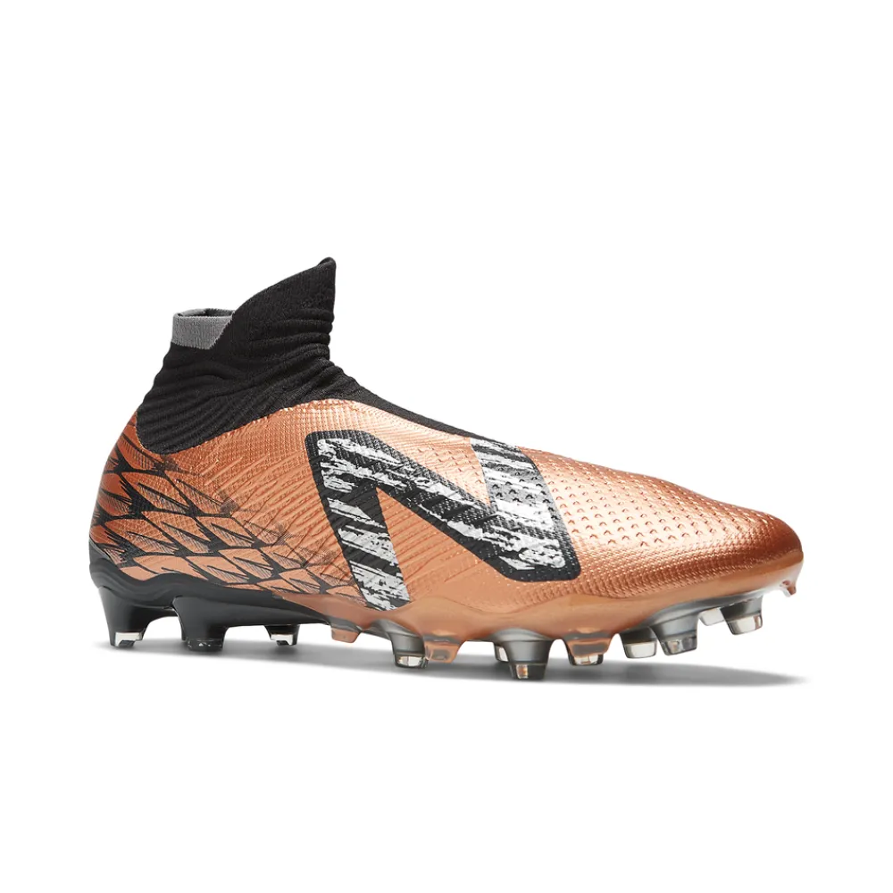 PIKANOENA*New Balance PIKANOENA Korki męskie TEKELA V4 PRO FG ST1FCB4 – pomarańczowe