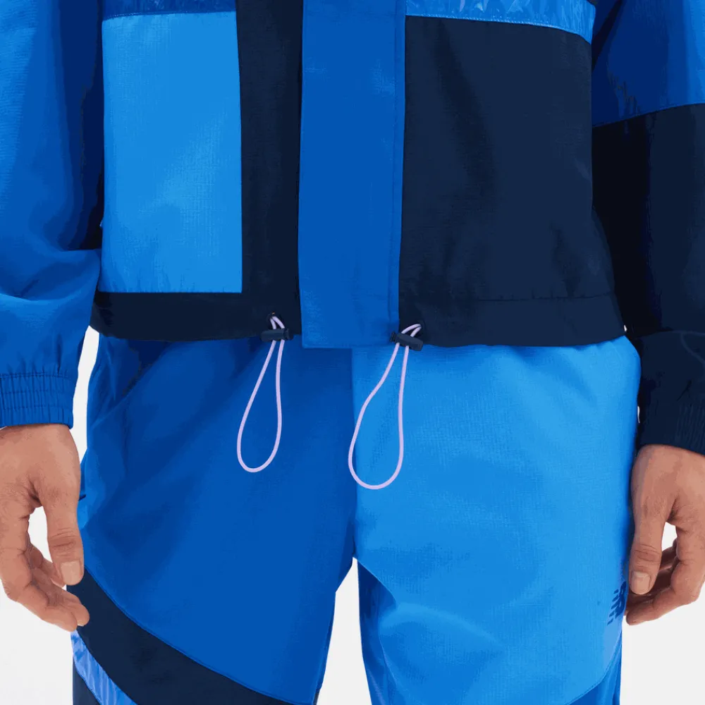 ODZIEZ BIEGOWA|BIEGANIE*New Balance ODZIEZ BIEGOWA|BIEGANIE Kurtka damska WJ23108NGO – niebieska