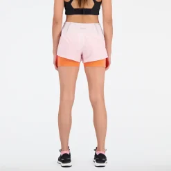 ODZIEZ BIEGOWA|BIEGANIE*New Balance ODZIEZ BIEGOWA|BIEGANIE Spodenki damskie WS21271SOI – różowo–pomarańczowe