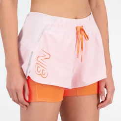 ODZIEZ BIEGOWA|BIEGANIE*New Balance ODZIEZ BIEGOWA|BIEGANIE Spodenki damskie WS21271SOI – różowo–pomarańczowe