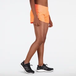 ODZIEZ BIEGOWA|BIEGANIE*New Balance ODZIEZ BIEGOWA|BIEGANIE Spodenki damskie WS21267NDF – pomarańczowe