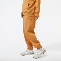 New Balance Spodnie męskie MP23551TOB – pomarańczowe