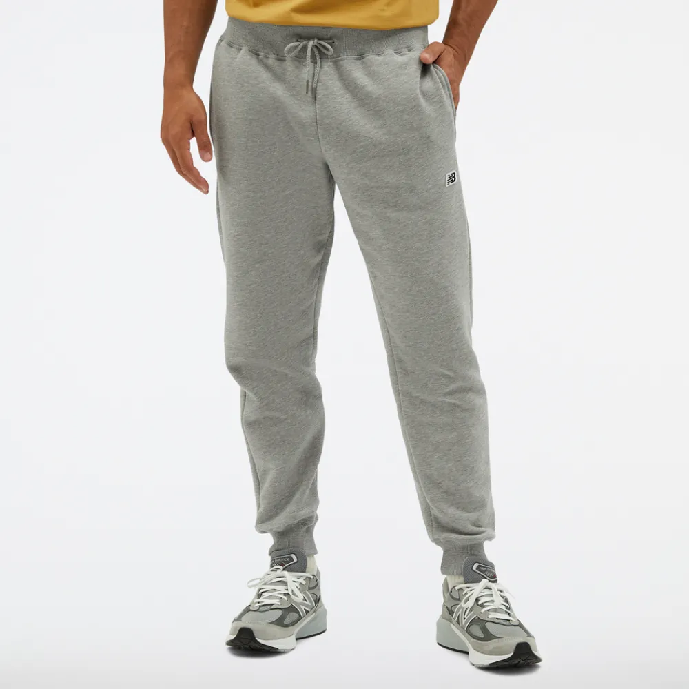 New Balance Spodnie męskie MP23600AG – szare