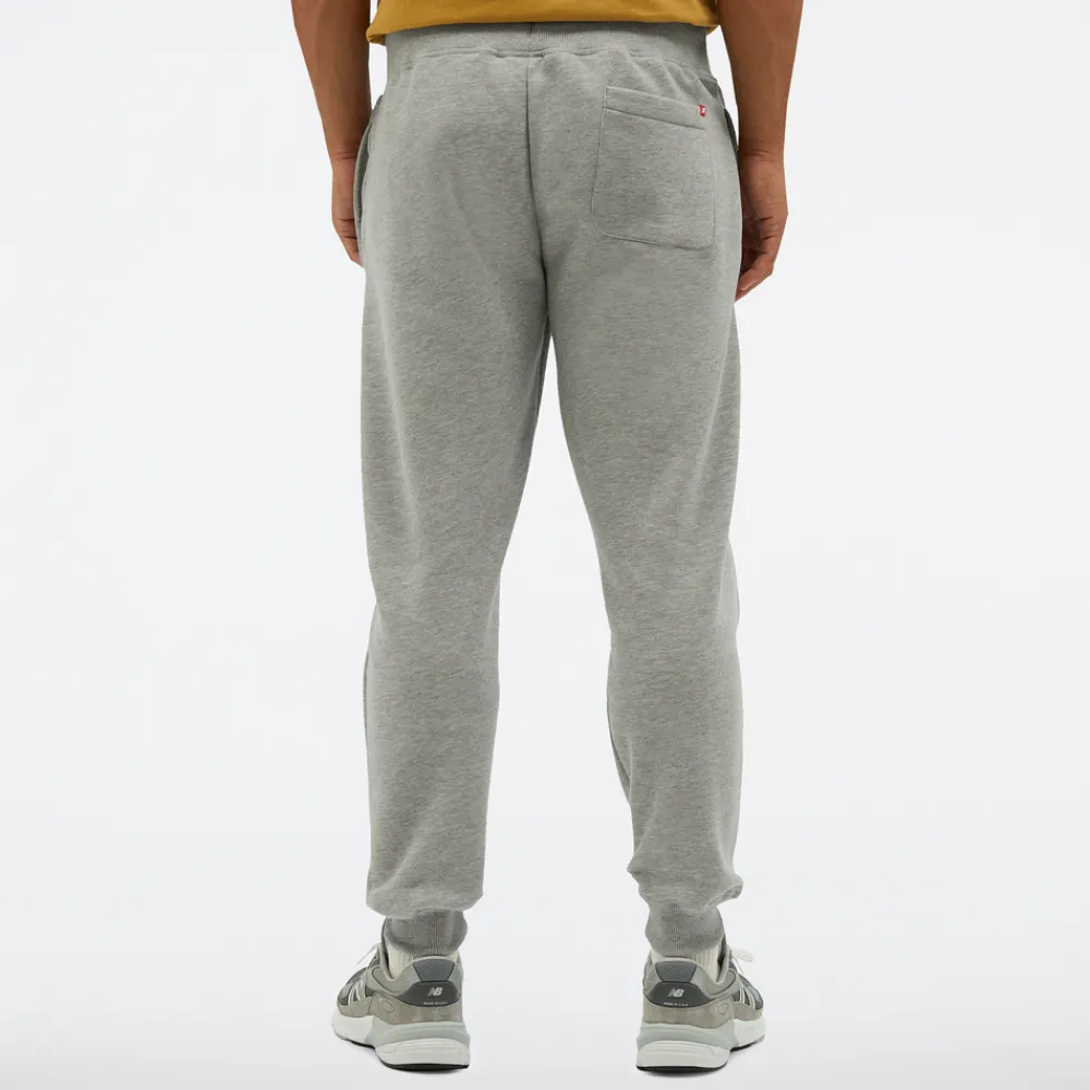 New Balance Spodnie męskie MP23600AG – szare