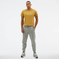 New Balance Spodnie męskie MP23600AG – szare