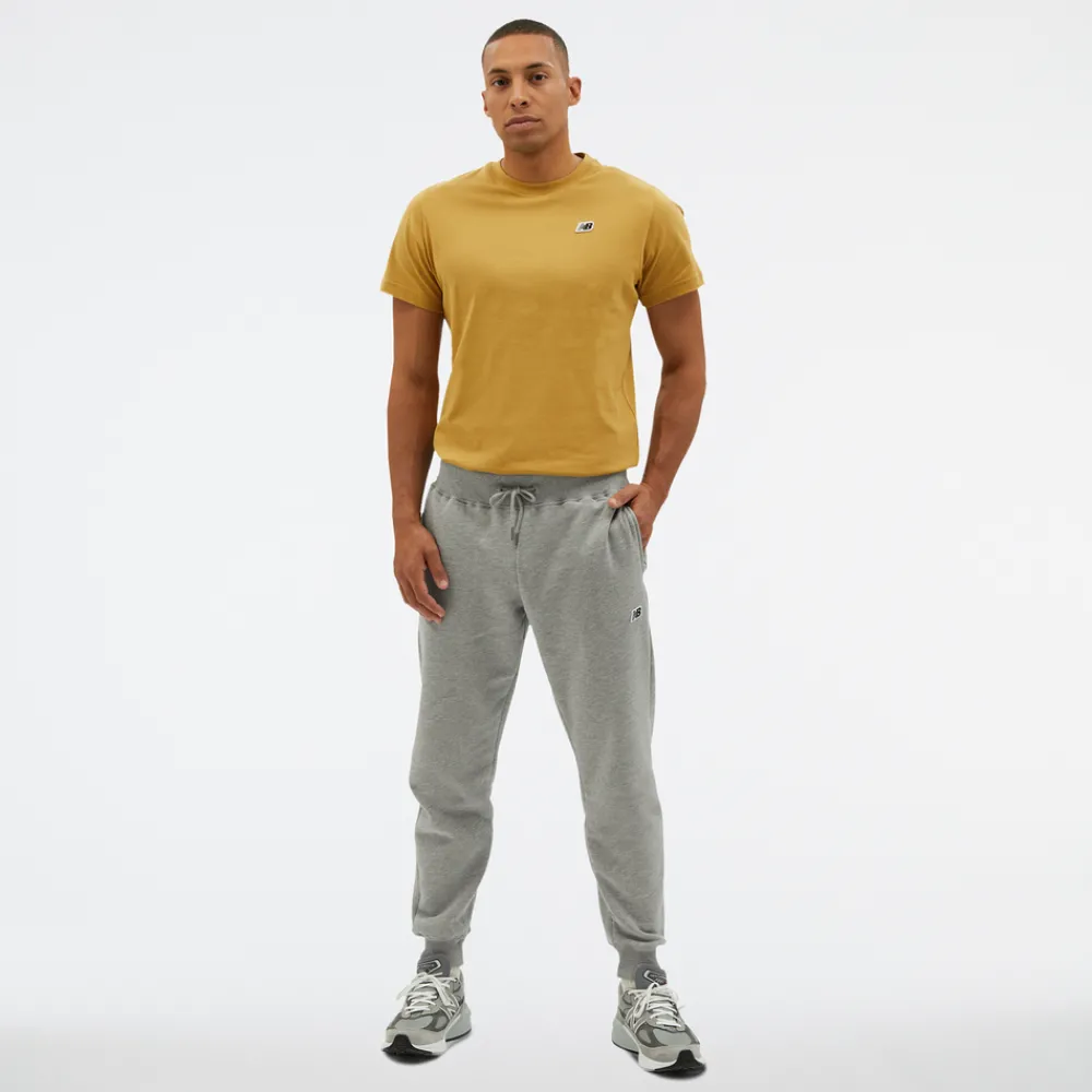New Balance Spodnie męskie MP23600AG – szare