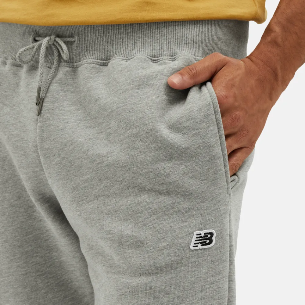New Balance Spodnie męskie MP23600AG – szare