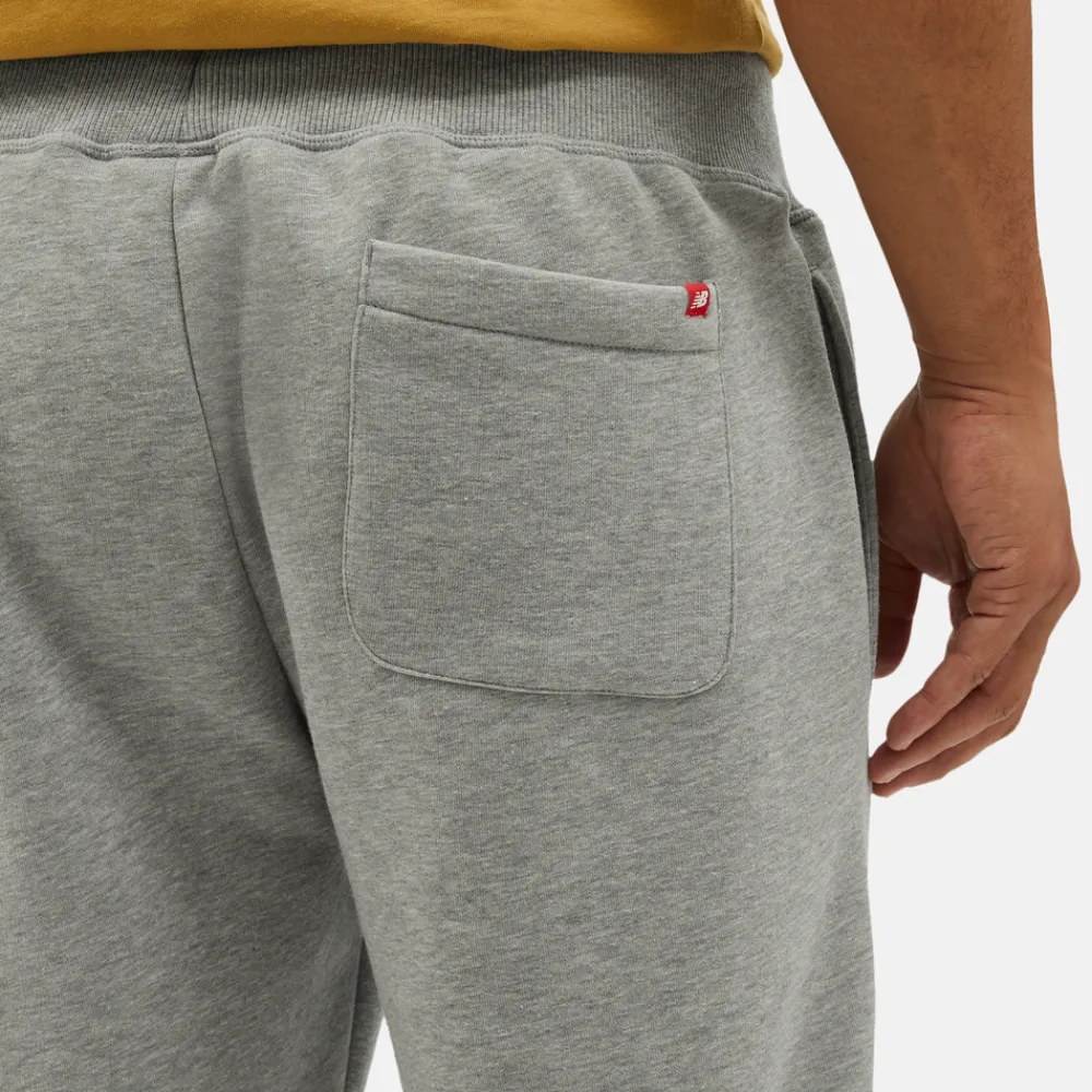 New Balance Spodnie męskie MP23600AG – szare