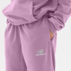 New Balance Spodnie unisex UP21500LLC – różowe