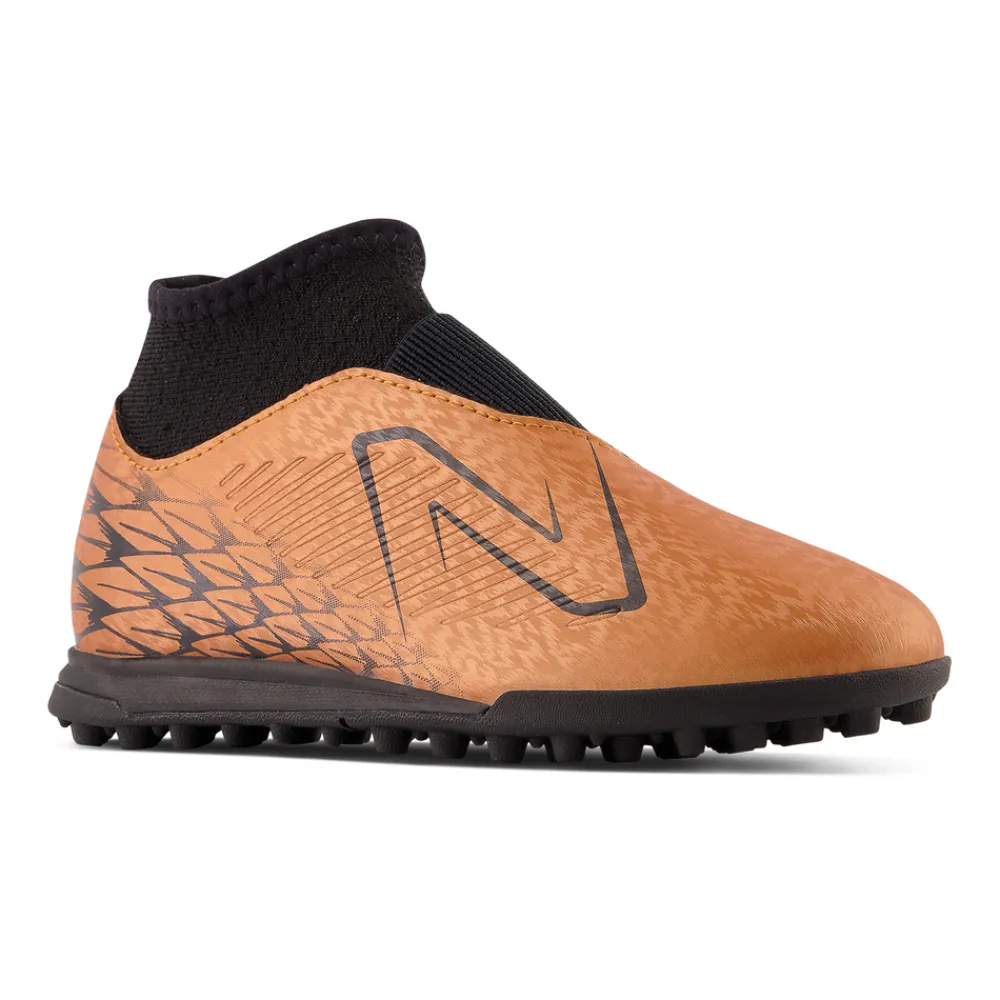 PIKANOENA*New Balance PIKANOENA Turfy dziecięce TEKELA V4 MAGIQUE JNR FG SJT3TCB4 – pomarańczowe